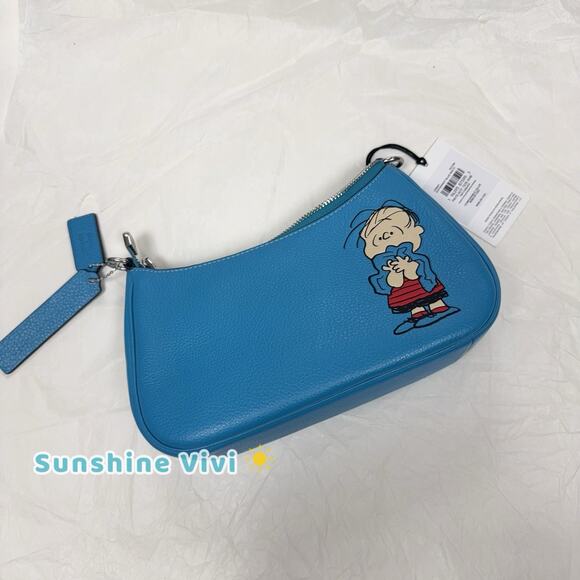 NWT Coach CBM31 X Peanuts Teri Shoulder Bag Linus Pebble Leather Parrot Blue - Picture 4 of 5